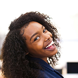 Foto de uma pessoa sorrindo