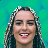 Foto de uma pessoa sorrindo